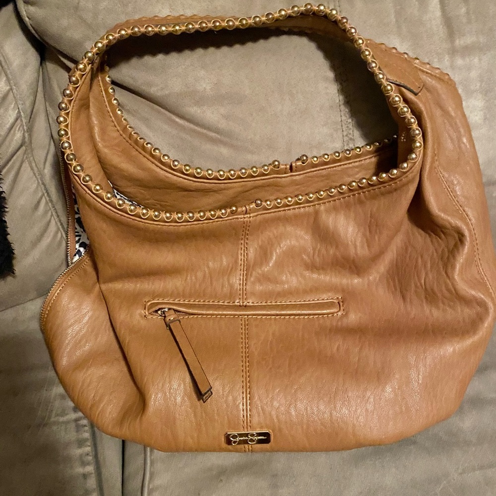 Sort of a light/medium brown Jessica Simpson shoulder bag.